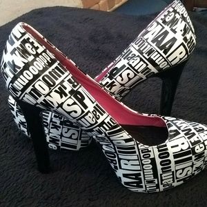 White and Black Pumps